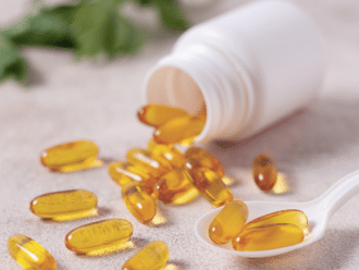 Vitamin D In A Container And Pills